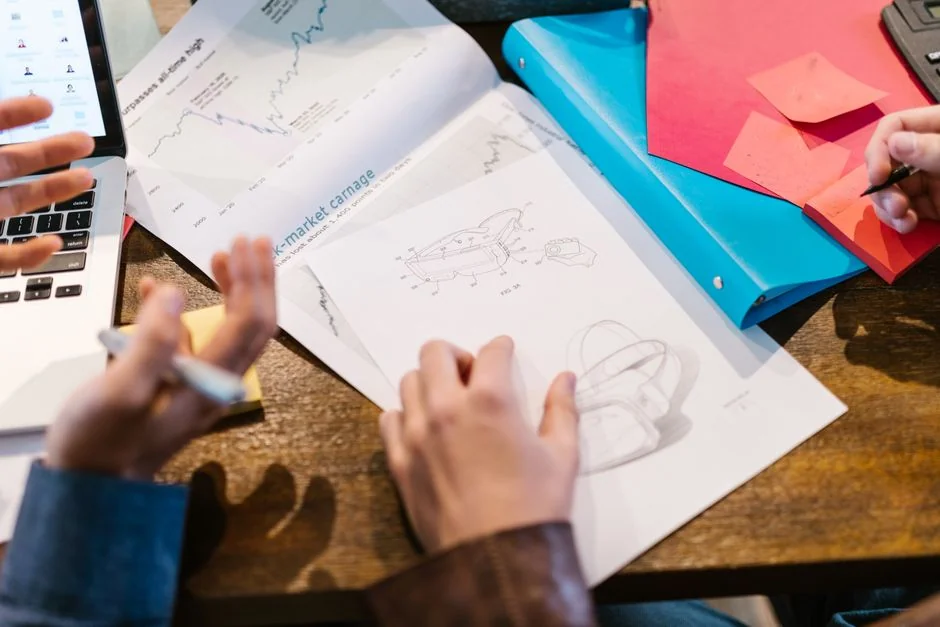 heros-img Focus on employer branding with documents on a wooden desk, ideal for business concepts.